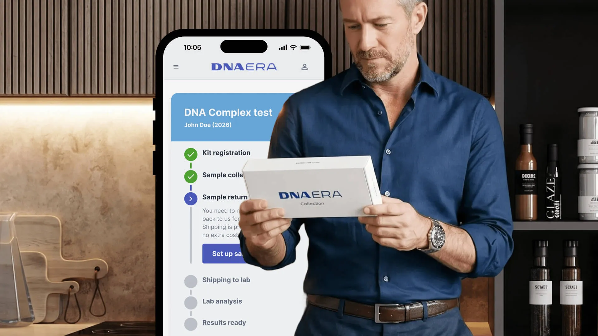 Man holding the DNA ERA collection box next to a phone showing the app's onboarding flow